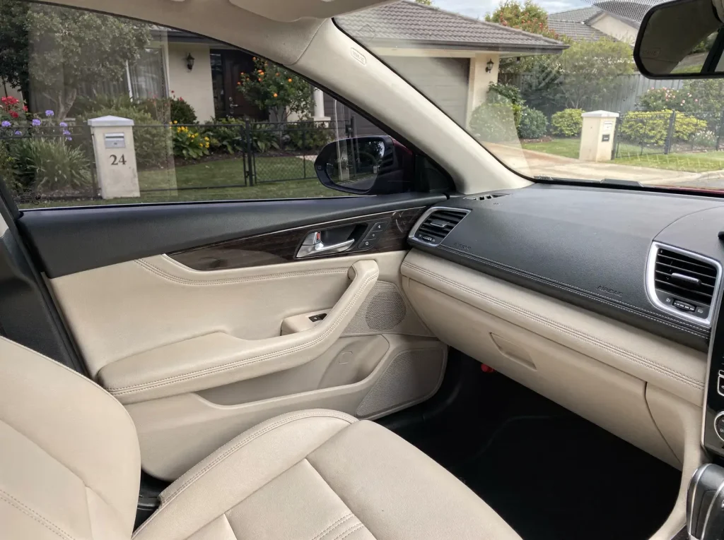 Freshly detailed car interior with spotless seats and vacuumed carpet in O'Connor.