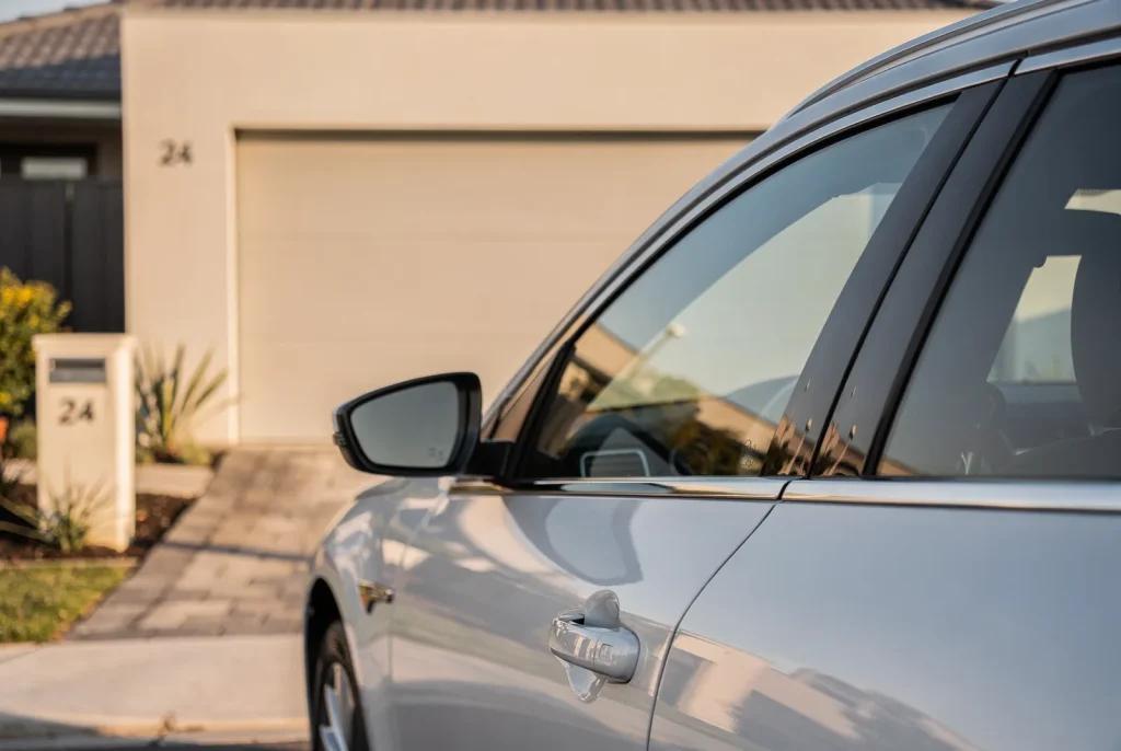 Glossy paint finish on a freshly detailed car in O'Connor.